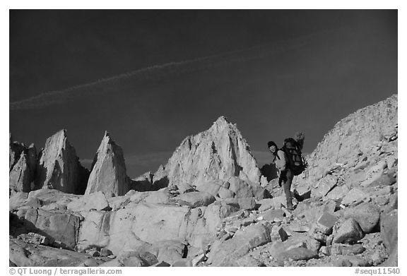 Woman with backpack hiking at the base of Mt Whitney. Sequoia National Park, California