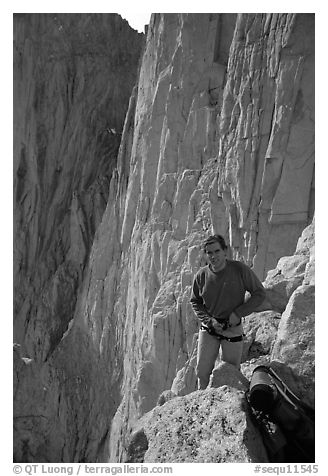 Man gearing up to climb  East face of Mt Whitney. Sequoia National Park, California