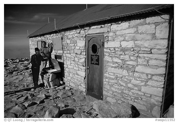 Hikers and Mt Whitney summit shelter. Sequoia National Park, California