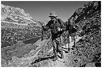 Father and son on trail above Long Lake, John Muir Wilderness. Kings Canyon National Park, California (black and white)