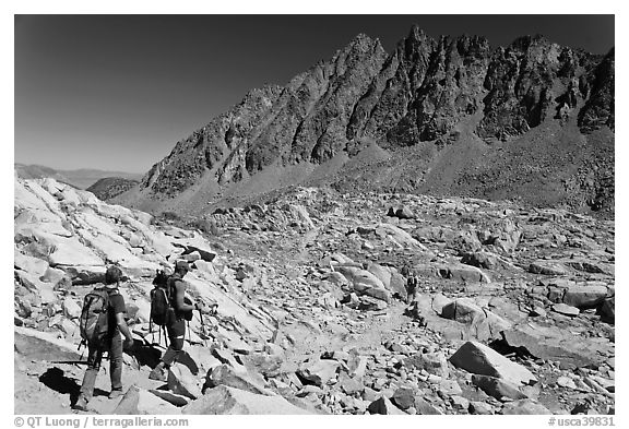 Hikers below Bishop Pass, John Muir Wilderness. Kings Canyon National Park, California