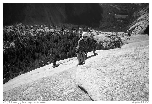 Rock climbers on the Snake Dike route, Half-Dome. Yosemite National Park, California