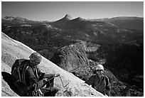 Climbing the Snake Dike route, Half-Dome. Yosemite National Park, California (black and white)