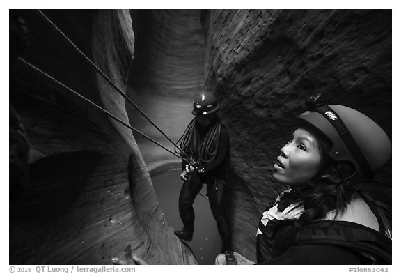 Women canyoneering in Keyhole Canyon. Zion National Park (black and white)