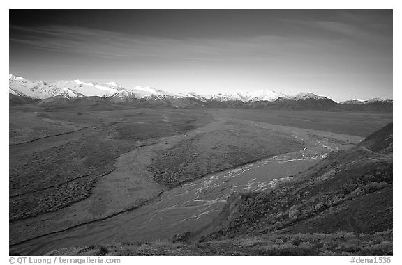 Wide valley with braided rivers and Alaska Range at sunrise from Polychrome Pass. Denali National Park, Alaska, USA.