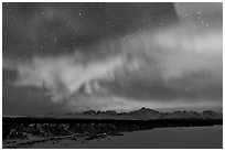 Aurora and stars above Alaska range. Denali National Park, Alaska, USA. (black and white)