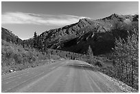 Unpaved section of park road and Mt Healey Range. Denali National Park ( black and white)