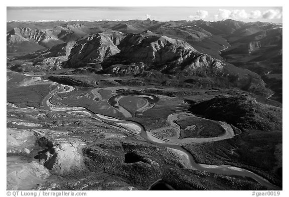 Aerial view of vast landscape of meandering Alatna river and mountains. Gates of the Arctic National Park (black and white)