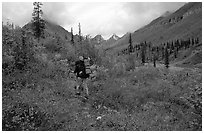 Backpacker in Arrigetch Creek. Gates of the Arctic National Park, Alaska (black and white)