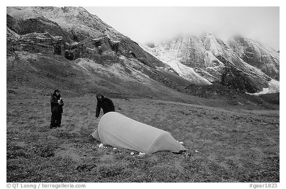 Backpackers camp at the base of the Arrigetch Peaks. Gates of the Arctic National Park, Alaska