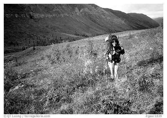 Backpacker in Arrigetch Creek. Gates of the Arctic National Park, Alaska