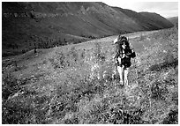 Backpacker in Arrigetch Creek. Gates of the Arctic National Park, Alaska (black and white)