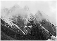 The Maidens with fresh show and a thin veil of clouds. Gates of the Arctic National Park, Alaska, USA. (black and white)