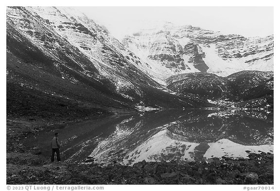 Visitor looking, Three River Mountain. Gates of the Arctic National Park (black and white)