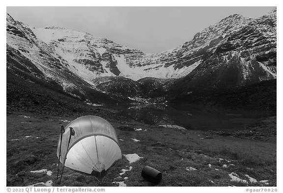 Lighted tent, lake, and Three River Mountain. Gates of the Arctic National Park (black and white)
