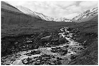 Stream and snowy mountains. Gates of the Arctic National Park ( black and white)