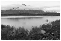 Pond and mountain above Anaktuvuk Pass, rain. Gates of the Arctic National Park ( black and white)