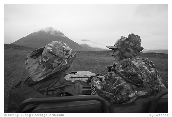 Nunamiut man and passenger on ATV. Gates of the Arctic National Park (black and white)