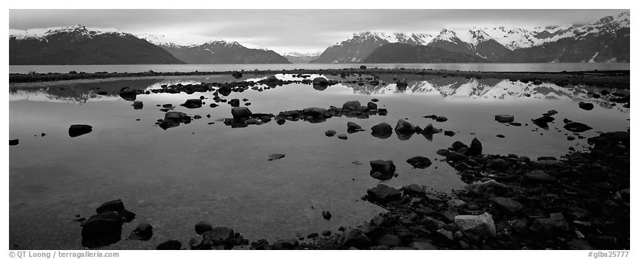 Blue scenery of water and mountains at dusk. Glacier Bay National Park (black and white)