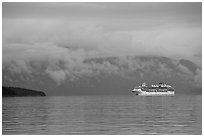 Cruise vessel in blue seascape. Glacier Bay National Park, Alaska, USA. (black and white)