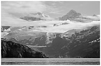 Rugged peaks of Fairweather range rising abruptly above the Bay. Glacier Bay National Park, Alaska, USA. (black and white)