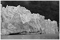 Front of Margerie Glacier against dark mountainside. Glacier Bay National Park, Alaska, USA. (black and white)