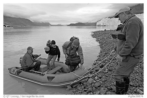 Film crew lands near Margerie Glacier. Glacier Bay National Park, Alaska, USA.