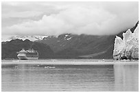 Cruise boat in Tarr Inlet next to Margerie Glacier. Glacier Bay National Park ( black and white)