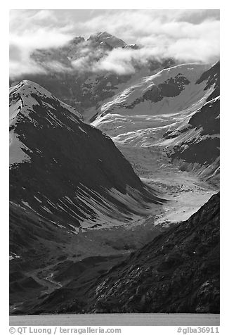 Topeka Glacier, peak and clouds, late afternoon. Glacier Bay National Park (black and white)