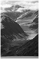 Topeka Glacier, peak and clouds, late afternoon. Glacier Bay National Park, Alaska, USA. (black and white)