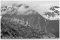 Rocky ridge and snowy peaks, West Arm. Glacier Bay National Park, Alaska, USA. (black and white)