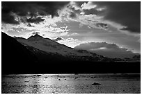 Mount Eliza and Tarr Inlet under clouds at sunset. Glacier Bay National Park, Alaska, USA. (black and white)