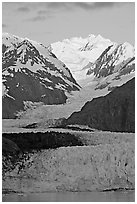 Margerie Glacier flowing from Mount Fairweather into the Tarr Inlet, sunrise. Glacier Bay National Park, Alaska, USA. (black and white)