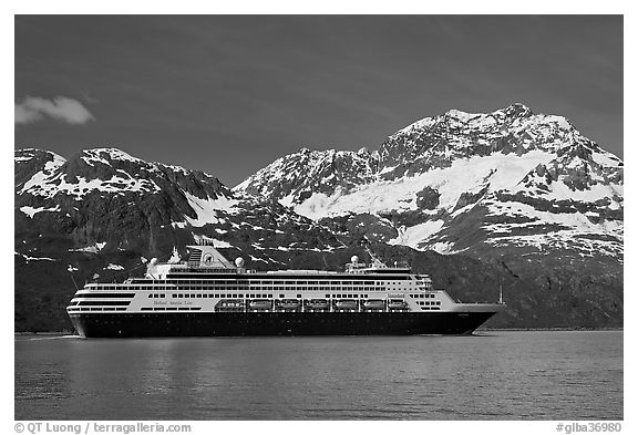 Cruise ship and snowy peaks. Glacier Bay National Park, Alaska, USA.