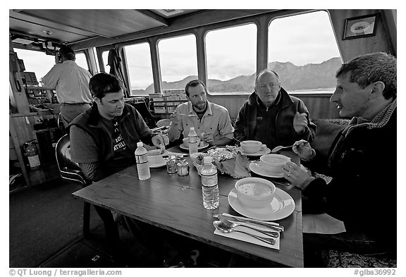 Passengers eating a soup for lunch. Glacier Bay National Park, Alaska, USA.