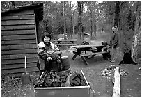 Camper ferrying loads into the campground. Katmai National Park, Alaska, USA. (black and white)