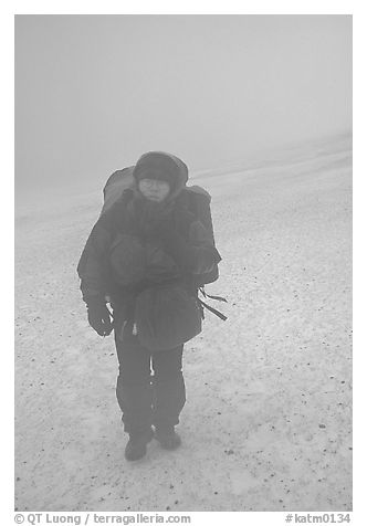 Backpacker in white-out conditions, Valley of Ten Thousand smokes. Katmai National Park, Alaska