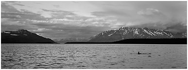 Lake and Mountains with pink clouds at sunset. Katmai National Park (Panoramic black and white)