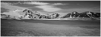 Snow-covered mountains contrasting with arid valley floor. Katmai National Park (Panoramic black and white)