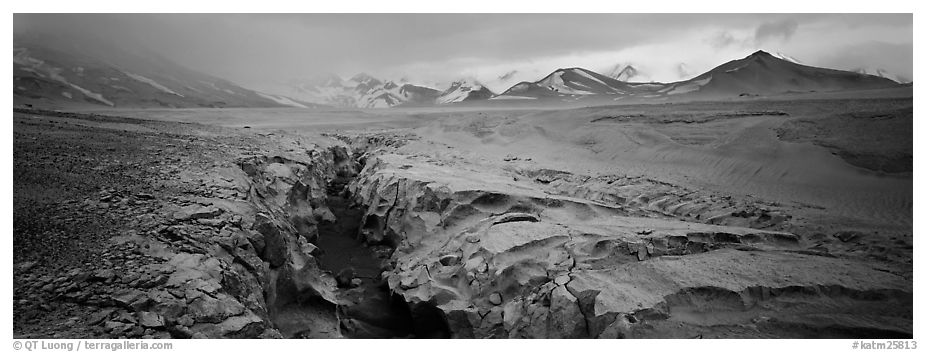 Stormy landscape with ash-covered valley and mountains. Katmai National Park (black and white)