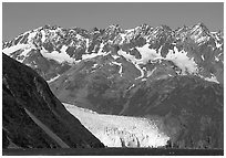 Aialik Glacier, fjord,  and steep mountains. Kenai Fjords National Park, Alaska, USA. (black and white)