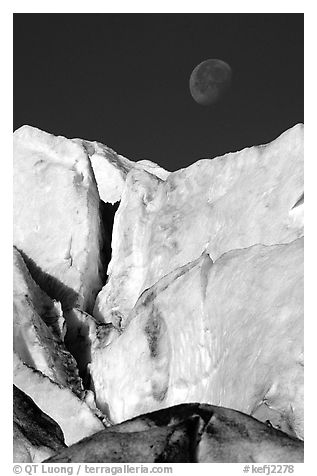 Seracs of Exit Glacier and moon. Kenai Fjords National Park, Alaska, USA.