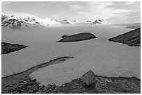 Melting neve in early summer and Harding ice field. Kenai Fjords National Park ( black and white)
