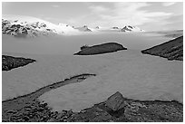 Melting neve in early summer and Harding ice field. Kenai Fjords National Park, Alaska, USA. (black and white)