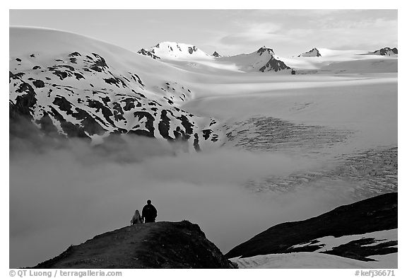 Two people hiking down Harding Ice Field trail. Kenai Fjords National Park (black and white)