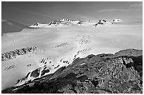 Lichen-covered rocks and Harding ice field. Kenai Fjords National Park ( black and white)