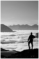 Man above a sea of clouds. Kenai Fjords National Park ( black and white)