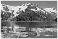 Rippled refections of peaks and glaciers, Northwestern Fjord. Kenai Fjords National Park, Alaska, USA. (black and white)