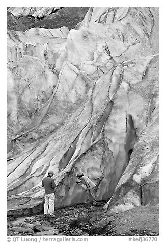 Couple checking out the ice at the terminus of Exit Glacier. Kenai Fjords National Park (black and white)