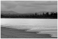 Sand bar shore, bright river and Baird mountains, evening. Kobuk Valley National Park ( black and white)